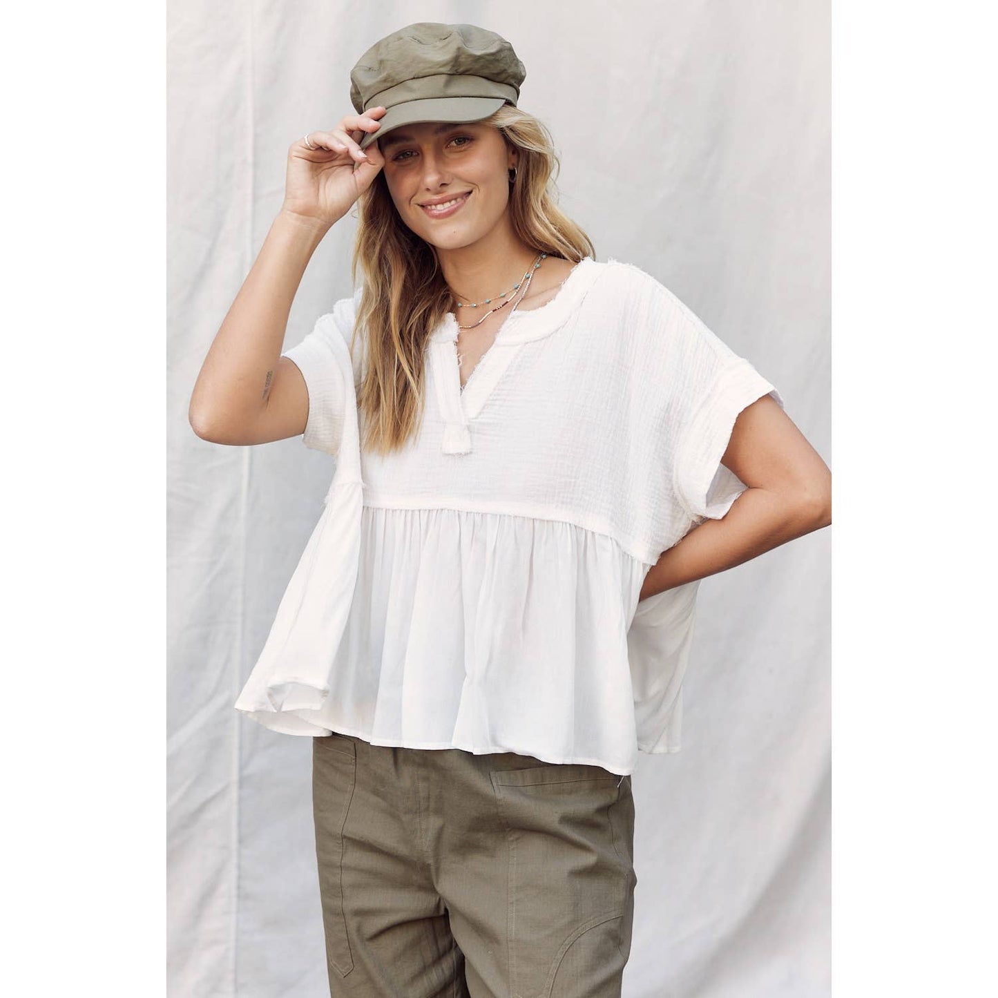 Raw Edge Ruffle Hem Top in Off White