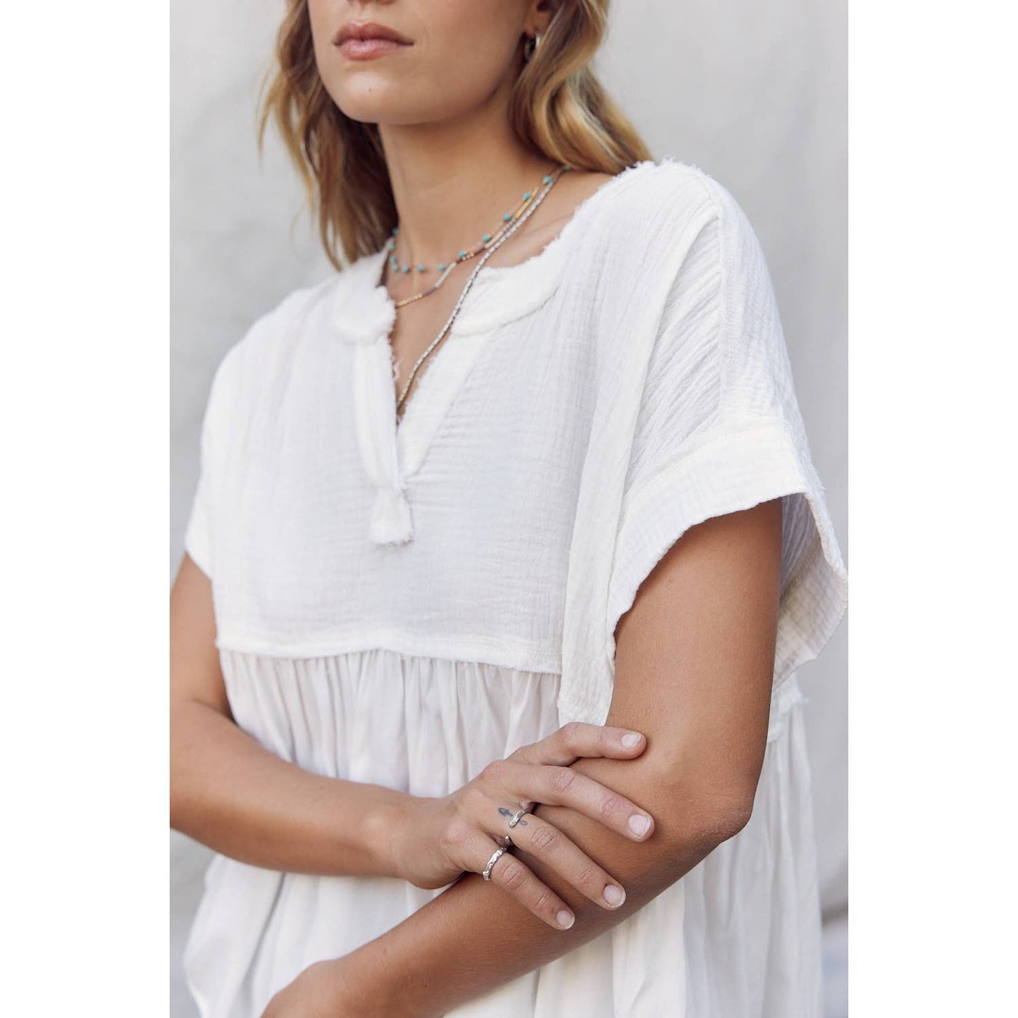 Raw Edge Ruffle Hem Top in Off White